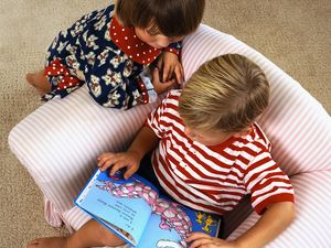 Boy and Girl Reading a Book